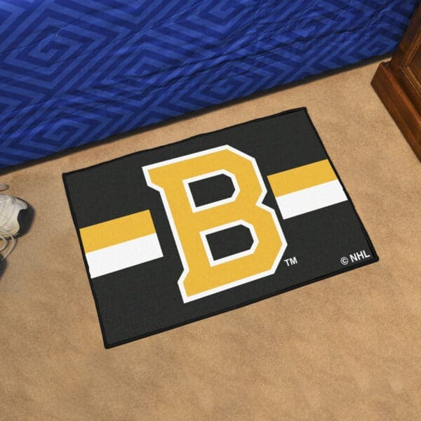 Boston Bruins Starter Mat Accent Rug - 19in. x 30in. Uniform Alternate Design-31927