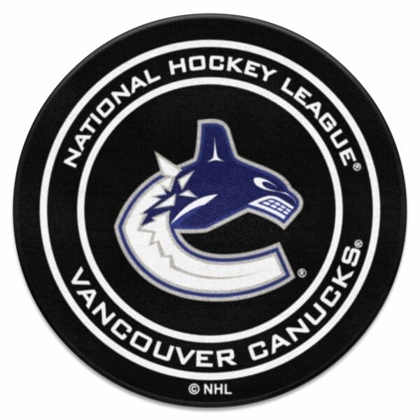 Vancouver Canucks Hockey Puck Rug 27in. Diameter 10285 1 scaled